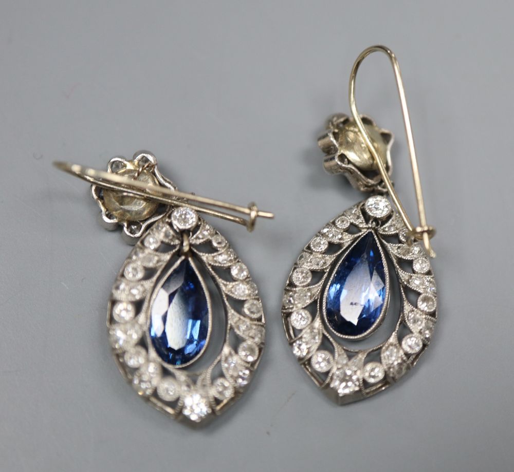 A pair of 1920s style white metal, sapphire and diamond set navette shaped drop earrings, 30mm, gross 6.5 grams.
